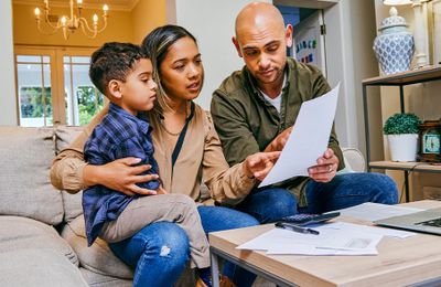 A household reviewing their energy bills at home